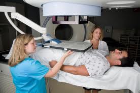 Picture of man getting x-rayed.